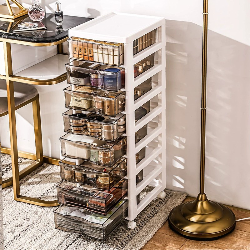 Organized dressing area with a rolling storage cabinet